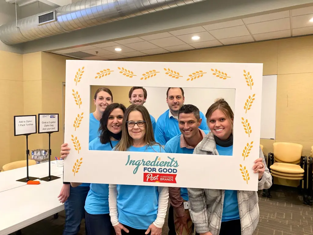 Post employees pose for a photo during Ingredients for Good volunteer event