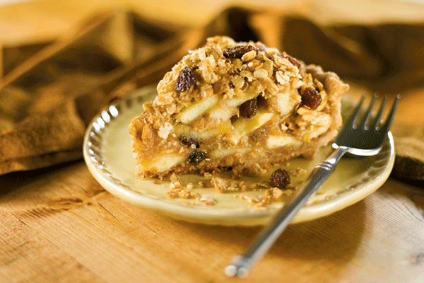 A slice of crunchy pecan apple pie