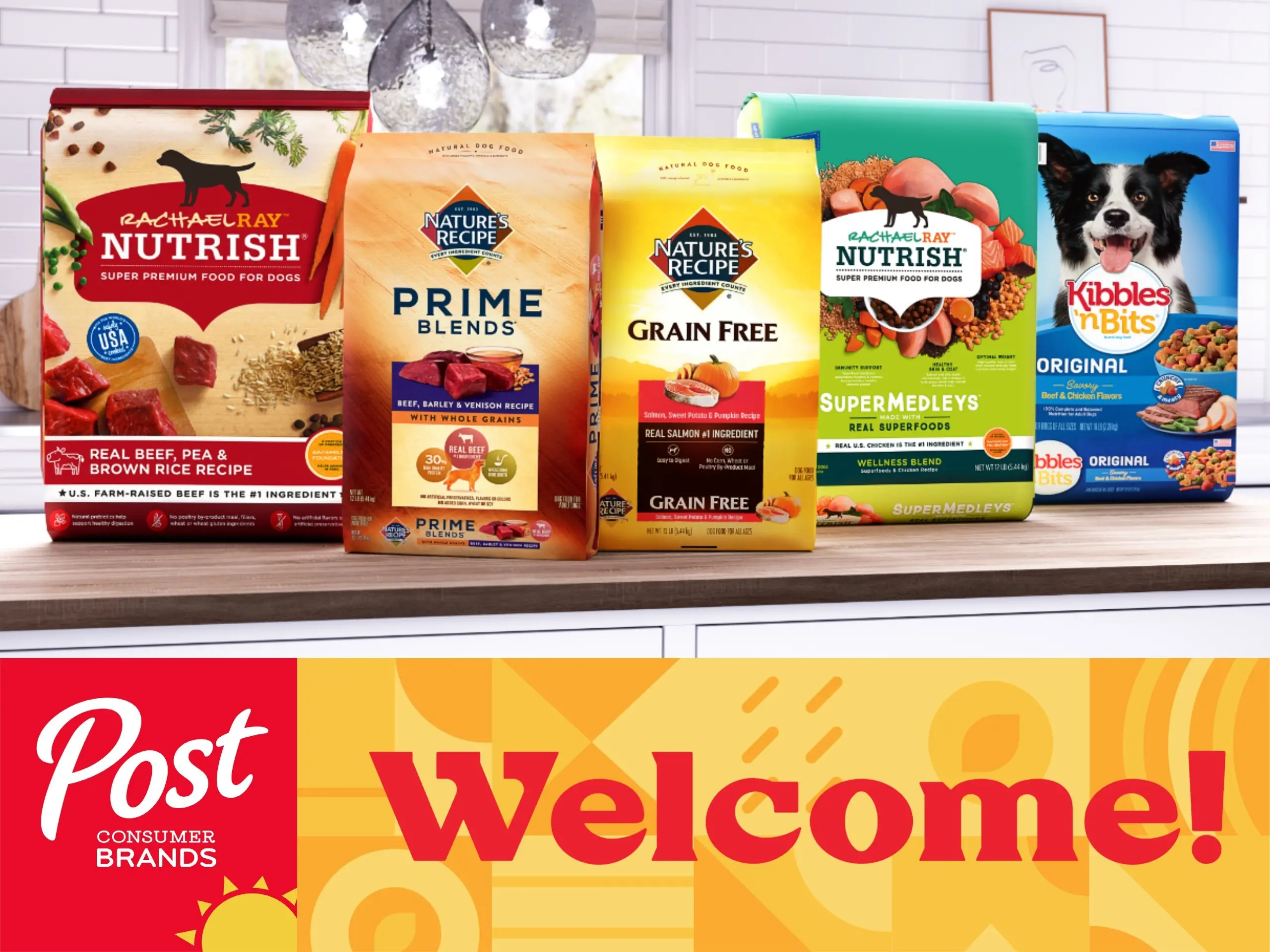 Pet food brands sit on a counter above a banner that says "Welcome!"