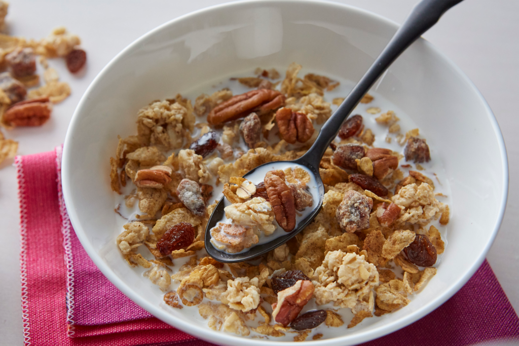 A bowl of Great Grains® Raisins, Dates & Pecans™ cereal