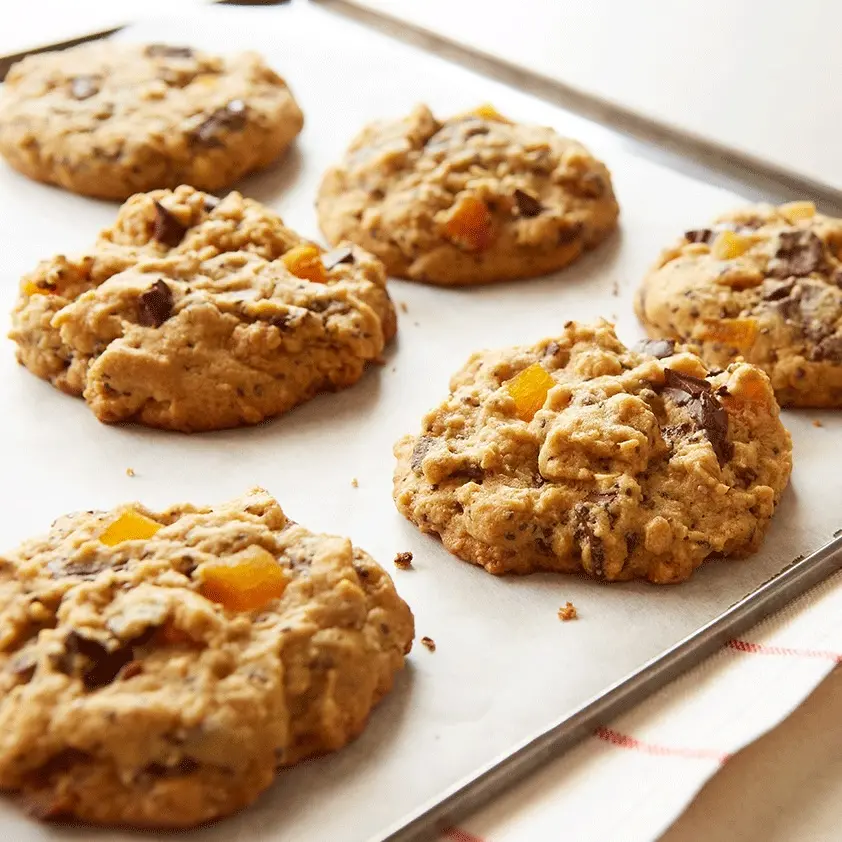 gluten-free oatmeal trail mix cookies on a sheet tray