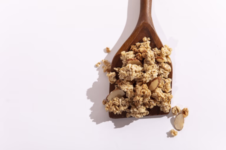 wooden spoon full of granola