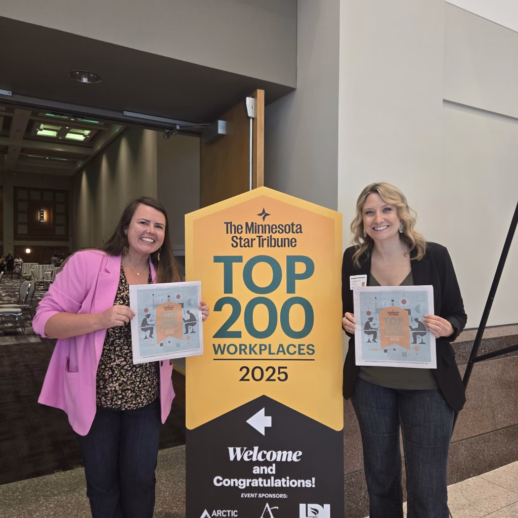 Post employees with the top 200 workplaces banner