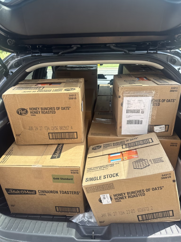 donation boxes in car trunk